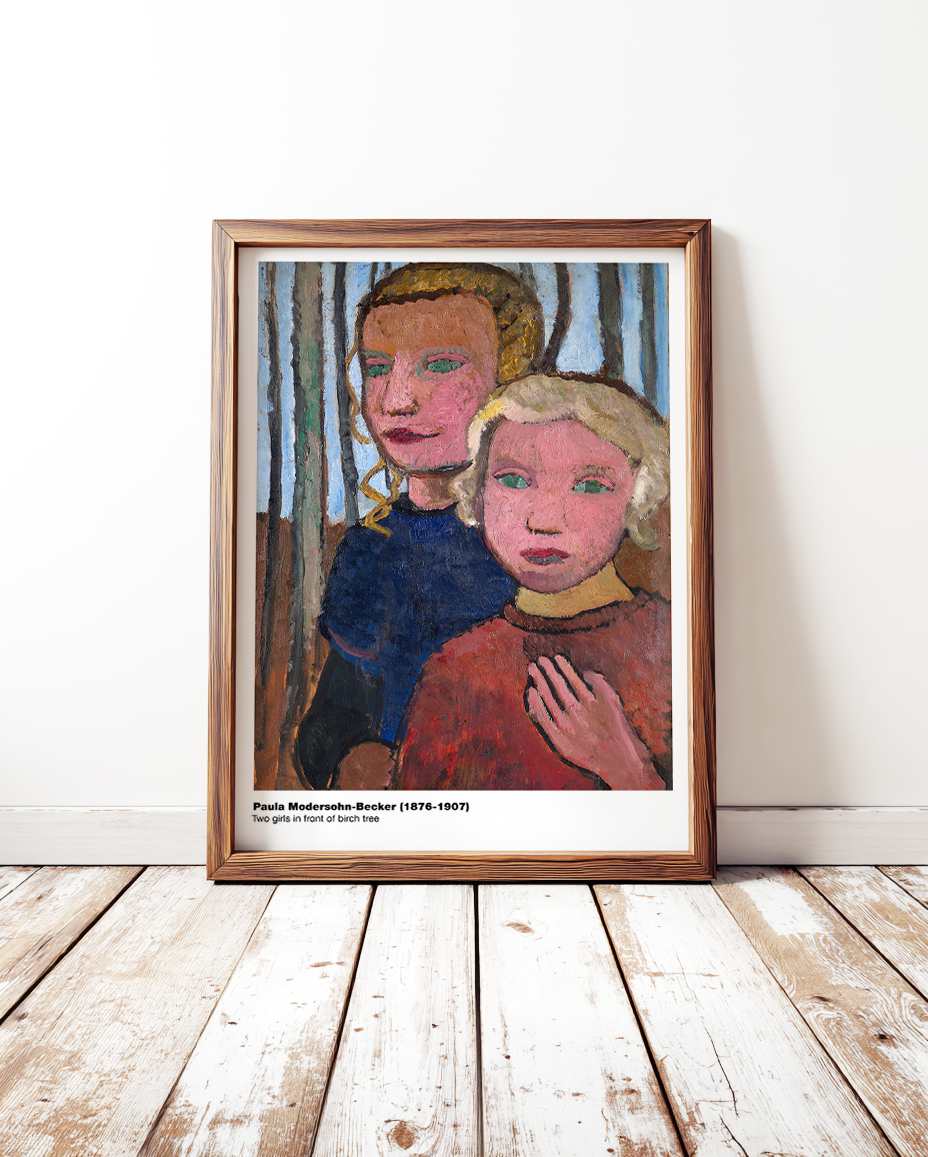 Two girls in front of birch tree