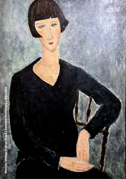 Woman Sitting in Blue Dress