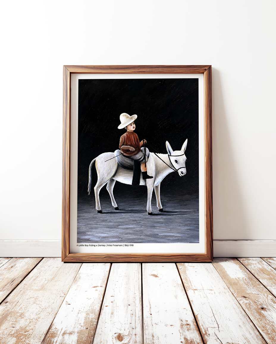 A Little Boy Riding a Donkey