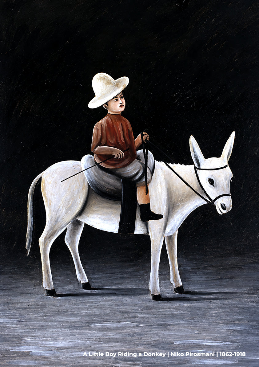 A Little Boy Riding a Donkey